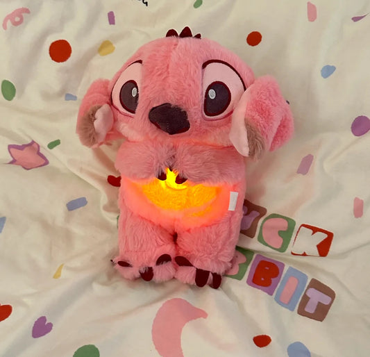 Peluche relajante para bebé que simula respiracion rosa